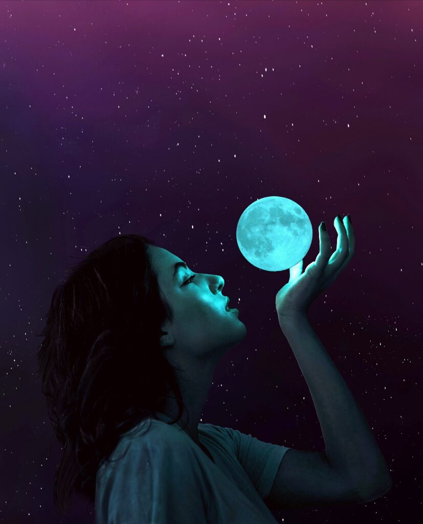 Astrological Moon Reading - Girl Holding Moon Picture